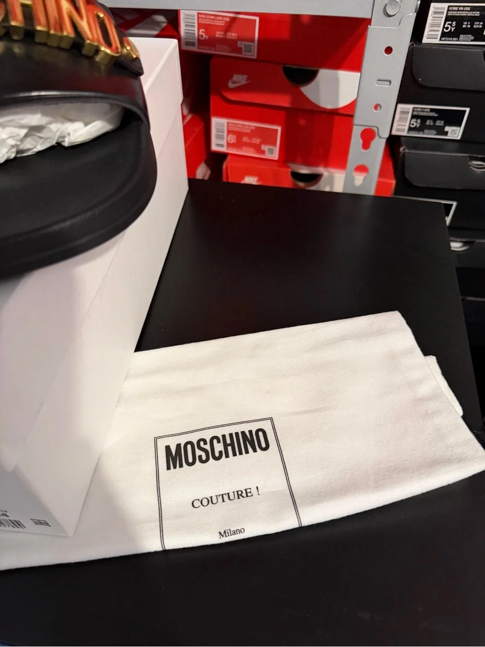 Moschino Black Slides with Gold Logo Plaque